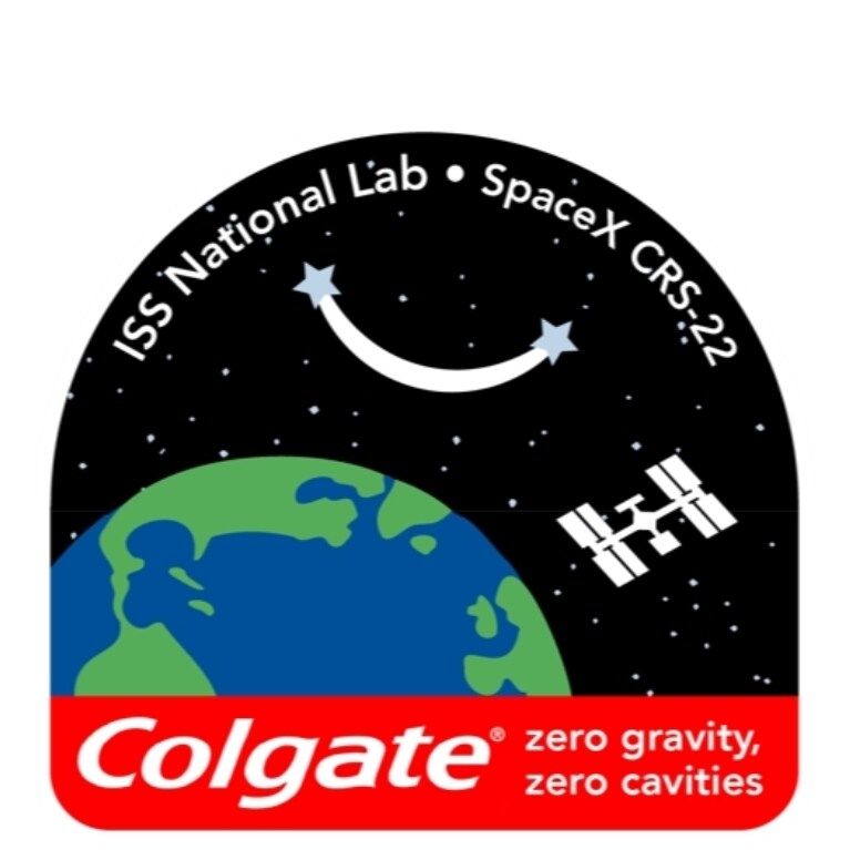 ISS National Lab logo with Colgate brand logo and zero gravity zero cavities tagline and SpaceX CRS-22